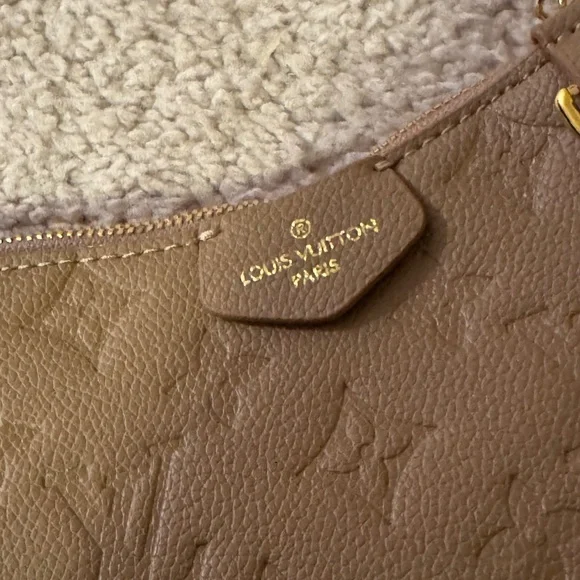 Tan monogram purse with gold accents - Picture 2 of 2